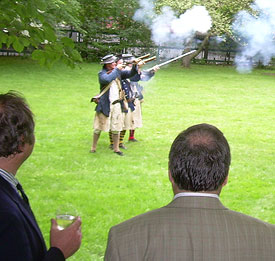 Pickering House friends from the 'Glover Regiment' firing their muskets.